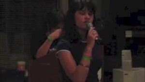A teenage girl singing