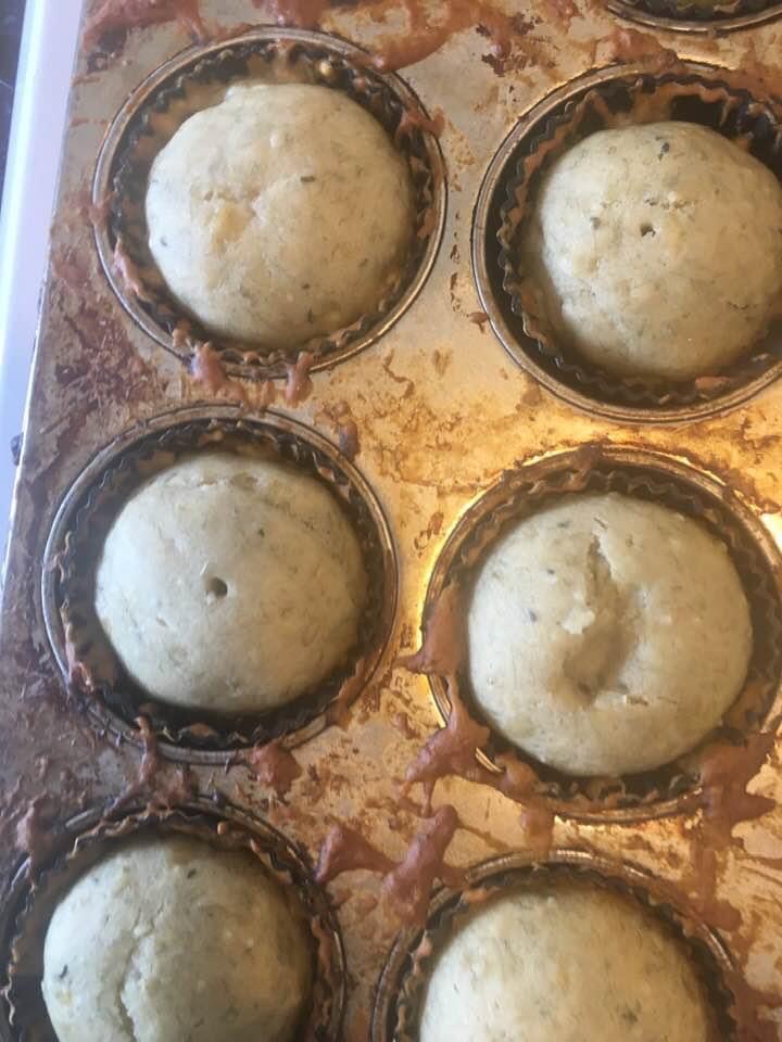 Six banana muffins in a pan.